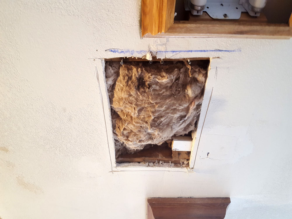 showing a ceiling where a drywall repair is needed.